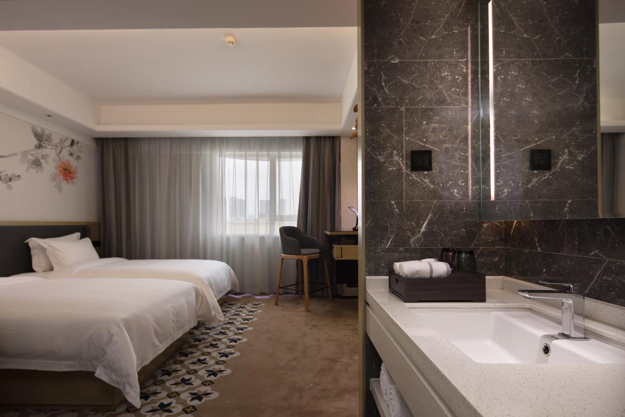 Paco Hotel Guangzhou Jiangtai Road Metro Branch Екстериор снимка